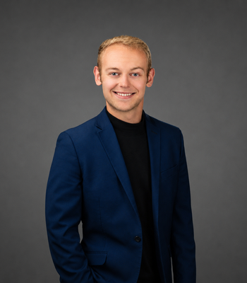 Portrait of Alex Branch, Realtor.